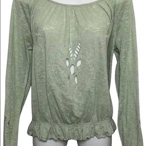 Free people blouse size small pale green with cutouts